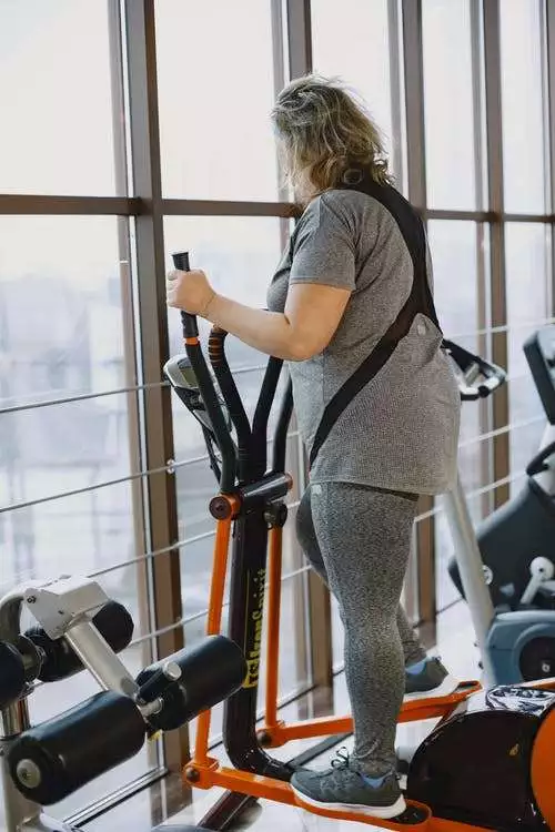 woman on elliptical trainer